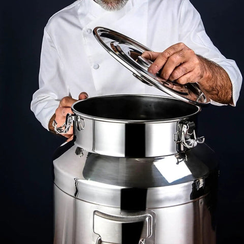 Chef opening Top Shelf 304 Stainless Steel Food Storage Container for coffee, rice, flour, and dry goods in kitchen.