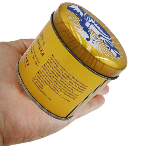 Person holding a yellow can with blue graphics and Chinese text; product details in red and black on side of can.