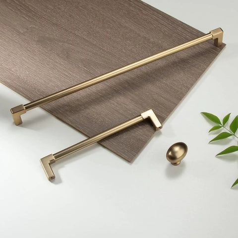 5 Pack Classic Solid Cabinet Handles In Champagne Bronze, 8 Inch (203 Mm) Screw Spacing with zinc alloy pulls shown on wood surface