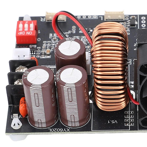 Close-up of Beefy CNC Voltage Power Supply 20A 1200W Constant Voltage Bucking Module, showing circuit components and cooling coil.