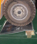 Rock Solid Aluminum Dock Plate 24 X 36 Inch Ramp With 3600 Pounds Capacity under forklift tire showing diamond tread and ramp dimensions.