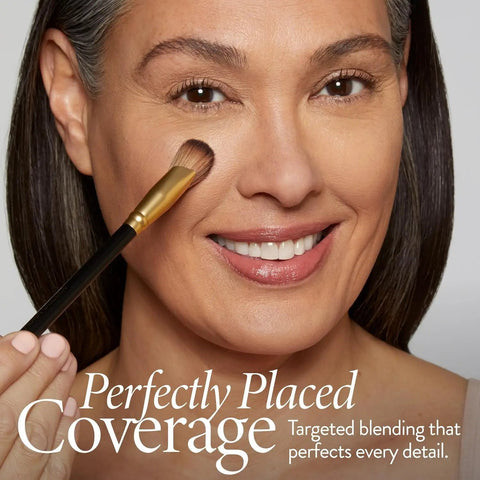 Angled Precision Concealer Brush for liquid and cream concealer used under eyes, showcasing cruelty-free makeup tool in action.