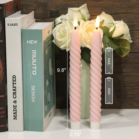 Pink Flameless Taper Candles Real Wax With Remote Timer 6 Pack 9.8 Inch LED Spiral 3D Wick beside books and roses