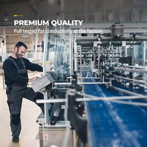 Factory worker testing equipment for conductivity quality check