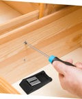 Installation of Two Pack Rubber Toggle Latch Clamps For Cargo Boxes And Mechanical Equipment on wood surface with screwdriver