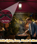 Man grilling under 8x8 Ft Grill Gazebo With Extra Large Adjustable Awning 2 Side Shelves 6 Hooks Powder Coated Steel BBQ Shelter
