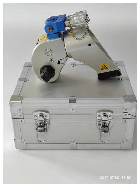 Professional Grade Hydraulic Torque Wrench With One Point Five Inch Square Drive on silver storage case, designed for heavy-duty jobs.