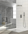 Wall Mounted Square Shower System with Adjustable Flow in brushed nickel finish mounted on tiled wall.