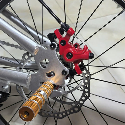 Close-up of All In One Mechanical Bike Disc Brake Kit With Front And Rear Calipers Two 160mm Rotors Cables Levers And Mounting Screws