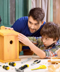 Father and son using Kids Tool Set With Real Metal Hand Tools Includes Hammer Wrench Pliers Level Tape Measure Clamps Screwdrivers Safety Goggles And Tool Bag Great Gift For Ages 8 Plus Home DIY Learning Kit For Boys And Girls to build a wooden birdhouse.