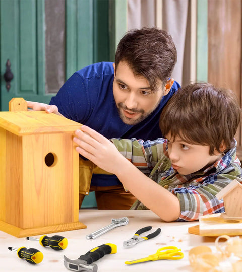 Father and son using Kids Tool Set With Real Metal Hand Tools Includes Hammer Wrench Pliers Level Tape Measure Clamps Screwdrivers Safety Goggles And Tool Bag Great Gift For Ages 8 Plus Home DIY Learning Kit For Boys And Girls to build a wooden birdhouse.