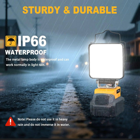 Cordless LED Work Light 11200 Lumens 112W under rain on asphalt street with IP66 waterproof rating