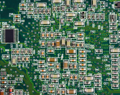 Close-up of PCB board featuring 320 Piece 0805 SMD Capacitor Kit With 16 Values From 10pF To 22uF 10V To 50V For Electronics DIY Projects