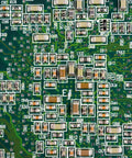Close-up view of a circuit board with 1206 SMD Capacitor Kit With 16 Values 320 PCS 10pF To 22uF MLCC Ceramic Assortment for prototyping.