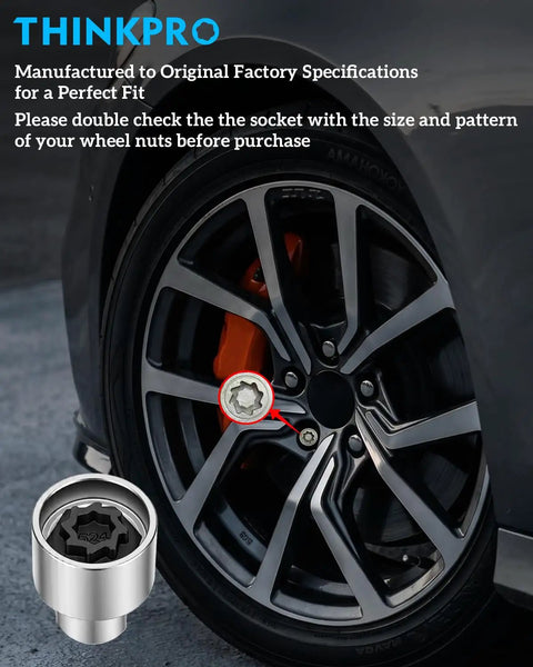 Close-up of Volkswagen Wheel Lock Key And Lug Nut Key Tool for VW Cars next to vehicle wheel.