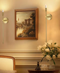Sleek Gold Wall Candle Sconces Set Of Two Large 23 Inch Modern Light Fixtures For Bedroom Dining Room And Living Room Chic Home Decor That Delivers Major Flex Ambiance Always, displayed beside artwork.