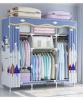 Super Roomy Portable Closet Organizer With Zero Fuss Snap Together Frame Heavy Duty Hanging Bars Two Extra Side Pockets For All Your Daily Threads And Home Gear Essentials filled with neatly hung clothes and bags.