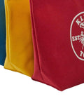 Close-up of 10 Inch Canvas Zipper Tool Pouches 3 Pack With Heavy Duty Brass Zippers And Brass Grommet For Hanging Assorted Red Blue Yellow