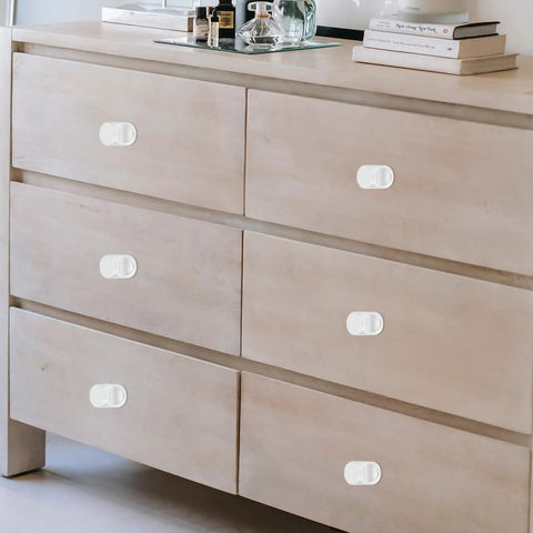 12 Pcs Matte Single Hole Cylindrical Cabinet Door Handles, Drawer Pulls For Kitchen Cabinets on a wooden dresser drawer