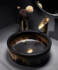 USZWBY Round Bathroom Vessel Sink with Faucet Combo 16.1" Art Wash Basin for Countertop Vanity in black with gold accents.