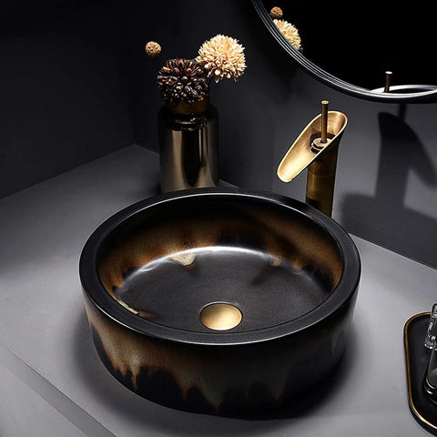 USZWBY Round Bathroom Vessel Sink with Faucet Combo 16.1" Art Wash Basin for Countertop Vanity in black with gold accents.