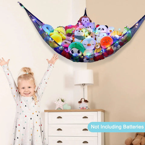 Cozy Plush Toy Hammock With LED Light Kid Friendly Net Storage Organizer for stuffed animals in a playroom wall corner