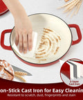 Hand cleaning 5 Quart Cast Iron Dutch Oven For Sourdough Baking With Domed Enamel Lid demonstrating non-stick properties.