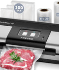 High Power Auto Vacuum Sealer With 95KPa Vacuum No Fuss Dry Wet Detection Built In Bag Cutter Includes Two Rolls Of Bags And One Hundred Precut Bags Effortless Operation In Sleek Silver And Black showing front view with sealed steak
