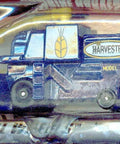 Blue And Yellow Farm Combine Harvester Diecast Toy One To Sixty Four Scale For Collectors And Kids in packaging