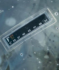 Close-up image of temperature gauge on 2.5 Gallon Solar Shower For Outdoor Camping And RV Use Four Layer Heat Retention System