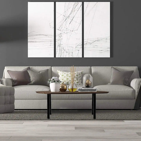 Modern living room with grey sofa, abstract art, and table with Beefy 34 Inch Bar Table Legs Set Of 2 Heavy Duty Industrial Black Metal Workhorse.