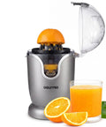 Gourmia Automatic Citrus Juicer One-Touch Operation Compact Electric Extractor With Universal Cone For Lemons Limes Oranges Grapefruits Anti-Drip Spout Dishwasher Safe Parts Quiet Motor Easy Cleanup with orange juice and fruit.