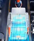 Top Shelf Heavy Duty Portable Evaporative Air Cooler With Six Blade Turbine And 3000W Motor in a workshop with airflow visible.