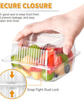 Hand holding 50 Pack Clear Plastic Takeout Containers With Hinged Lids for fruits, secure closure shown