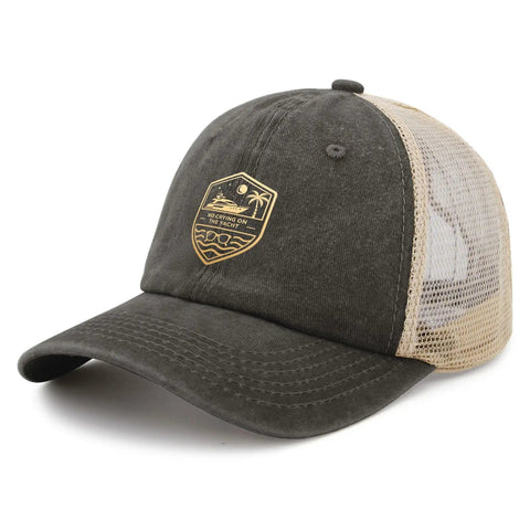 Womens No Crying On The Yacht Humor Trucker Hat with ventilated mesh, low profile black front, beige mesh back, and curved brim