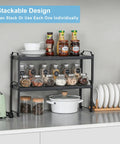 Built Tough Expandable Cabinet Shelf Organizer Set Featuring Adjustable Countertop Storage Rack To Knock Out Clutter And Keep Your Kitchen Stuff Locked In with jars and dishes stacked.
