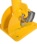 Tough As Nails Ground Mount Heavy Duty Steel Fold Down Bollard Padlock Secured Parking Lot Barrier Yellow base with padlock.