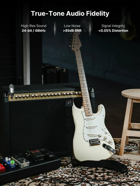 Electric guitar leaning on amplifier with pedalboard, demonstrating low noise and high signal integrity for Wireless Guitar System With 10 Channel Transmitter And Receiver, Dual Interface Design For 6.35mm And 3.5mm Gear, Plug And Play, Auto Pairing, Low Latency Wireless Performance.