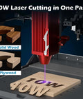 Genmitsu Kiosk 10W laser engraver with red head, 3.9x3.9 in engraving area; engraving wood with purple beam on a board