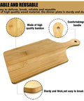 Front view of 11x5 in bamboo mini charcuterie board with handle and hanging hole