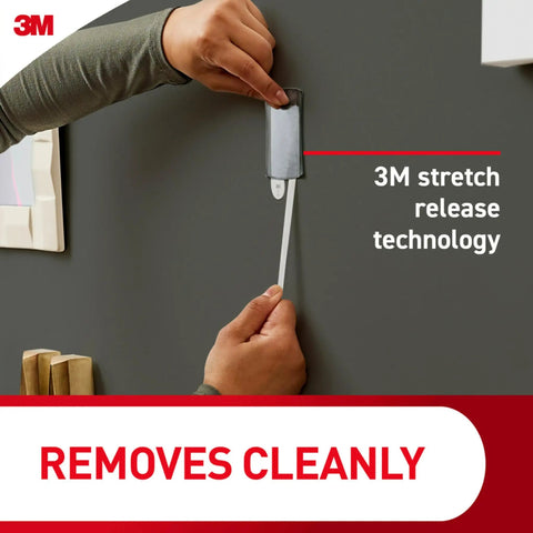 Applying a Slap On Universal Picture Frame Hangers Deliver Dead Easy Damage Free Wall Mounting Renter Approved Metal Adhesive Straps.