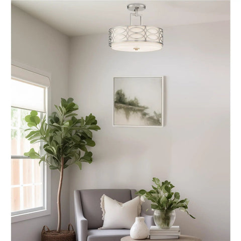 Sienna 15 Inch Sleek Modern Lattice Drum Semi Flush Mount Ceiling Light 3-Light Silver Finish in a cozy living room