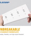 Person holding 4 Gang Toggle Switch Wall Plate Mid Size Tough As Nails Built To Last Unbreakable Polycarbonate Gloss White Finish UL Listed