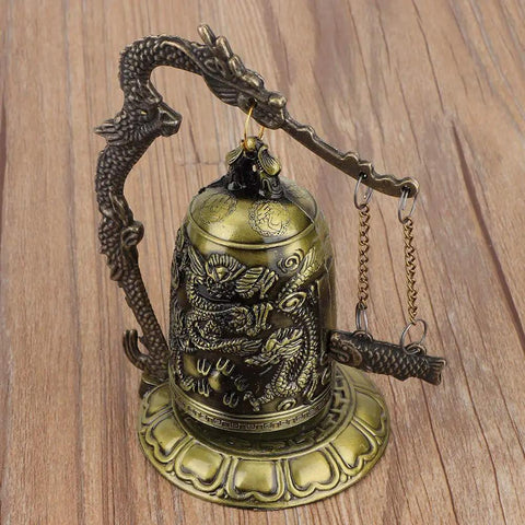 Vintage Bronze Dragon Lock Bell, Top Shelf Handcrafted Desktop Ornament With A Smooth Electroplate Finish, Super Sharp Home Decor Piece For Daily Display And Serious Collectors on a wooden surface.