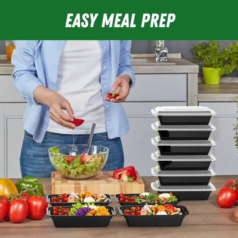 Person preparing salad next to stack of 32 Oz Meal Prep Containers Set, 50 Pack Reusable Food Storage Pans, black, on kitchen counter