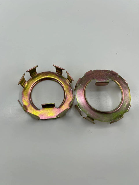 Two iridescent metal trailer spindle nut retainers for EZ-Lube jam nut on Dexter 2-8K axles.