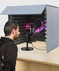 Rock Solid Desktop Soundproof Vocal Recording Booth Cube Featuring Heavy Duty Acoustic Foam Panels For Podcast Mic Isolation and Zero Noise Interference with microphone setup.