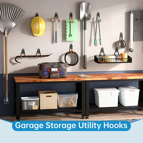 Wall-mounted steel hooks organizing garage tools and gear, including a rake, shovel, and cables, demonstrating use of 2 Pack Heavy Duty Garage Storage Utility Hooks For Tools And Garden Gear, Steel Wall Mount U Hooks Black, Holds 40 Lbs, Space Saving Organizer For Cables, Hoses, Brooms, Spades, Bikes, And More.