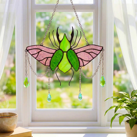 Stag Beetle Stained Glass Kit For Beginners With Pre Cut Pieces on window with vibrant green and pink glass suncatcher