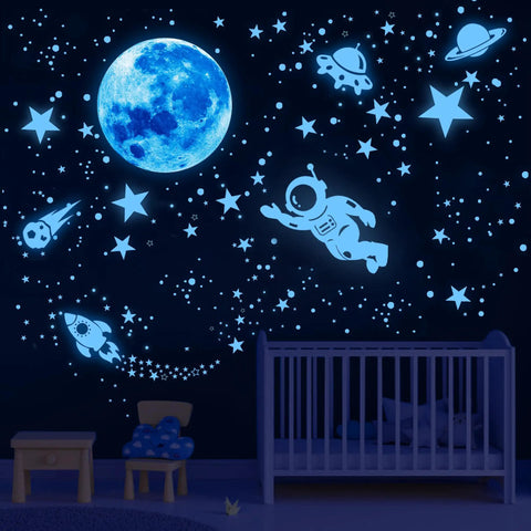 Glow In The Dark Stars Ceiling Set With Moon And Space Wall Decals in a kid's room, creating a starry night sky vibe above a crib.
